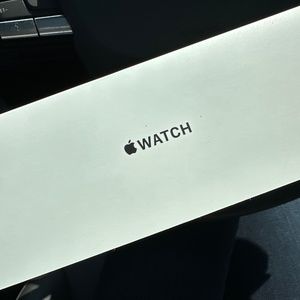 Small white Apple Watch band.
